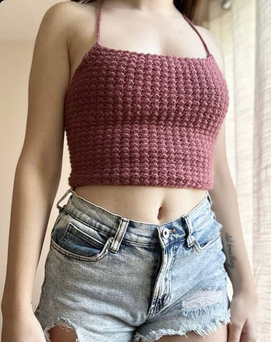 Image of a person wearing a crocheted classic halter top